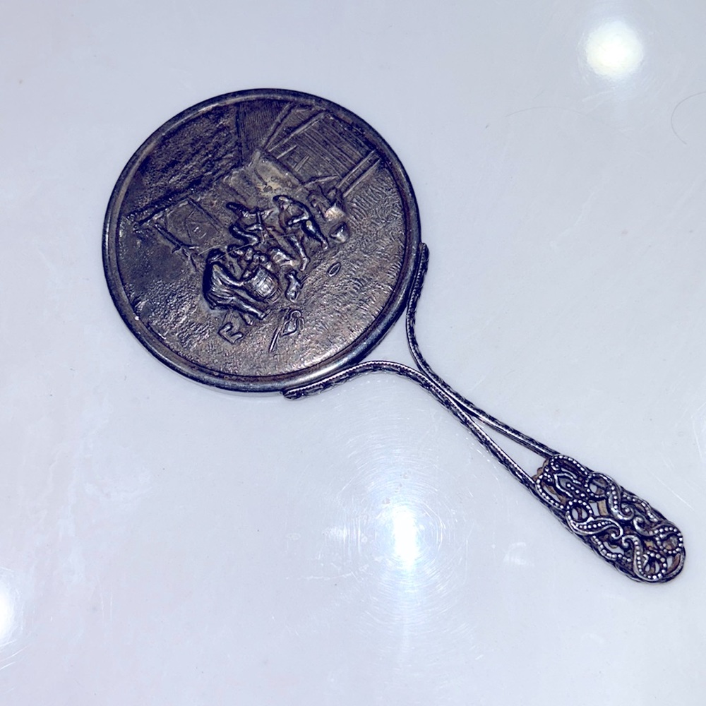 Antique handheld mirror